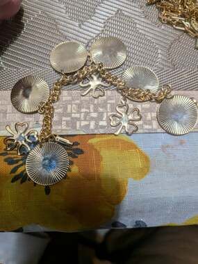 Vintage Gold Tone Charm Bracelet with Sunburst Discs and Clover Charms